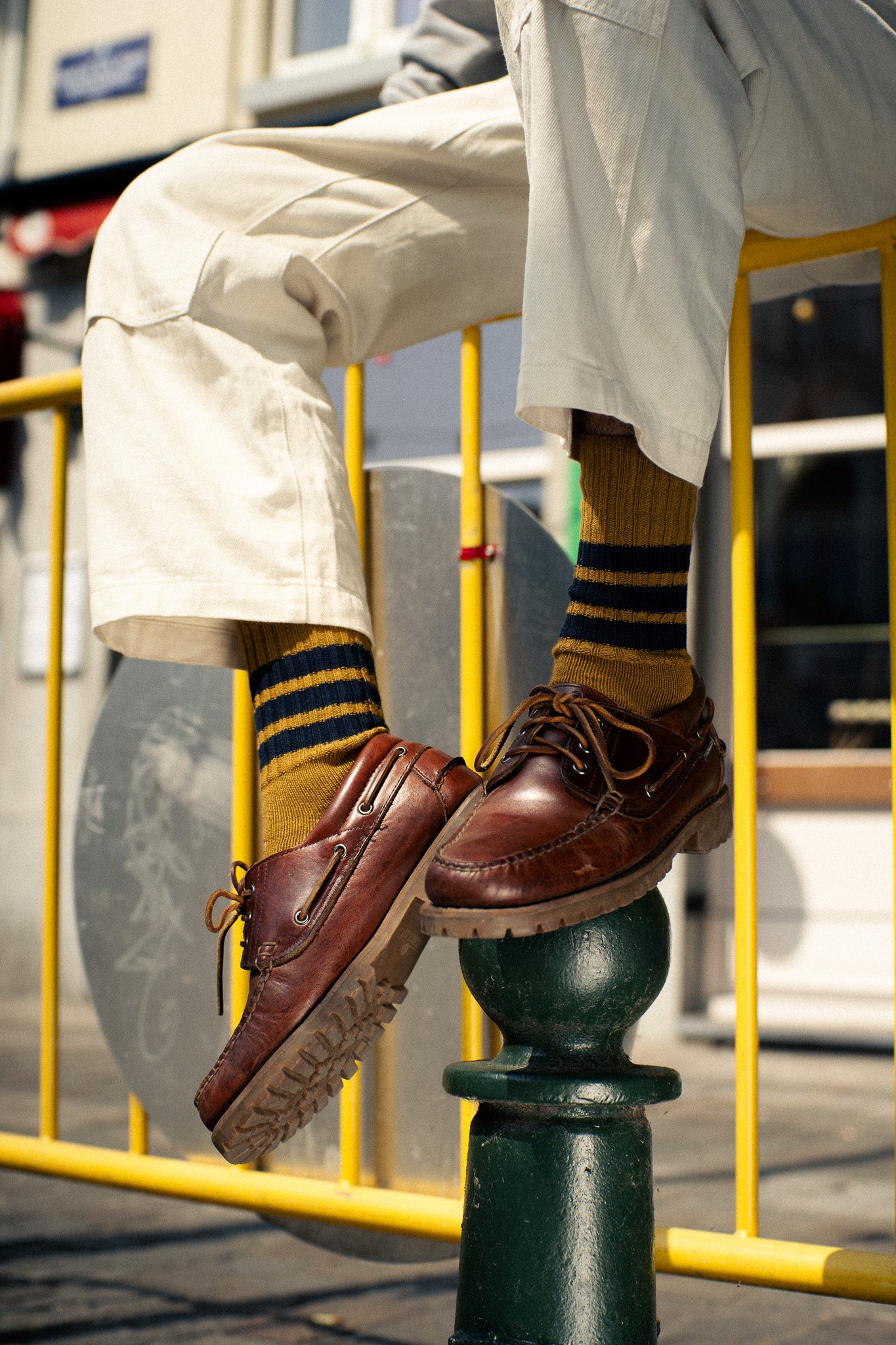Man wearing Escuyer men's striped crew socks, made in Portugal