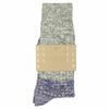 A pair of melange block socks in light grey and bright blue, crafted from cotton blend yarns and made in Portugal