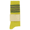 Yellow sock with green stripes on a white background