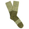 A pair of melange block socks in green colors, crafted from cotton blend yarns and made in Portugal