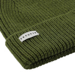 Side view of vert de gris ribbed merino wool beanie with folded cuff