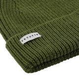 Side view of vert de gris ribbed merino wool beanie with folded cuff