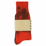 One-of-a-kind men's tie dye crew socks in orange and black, hand-dyed, made in Portugal by Escuyer