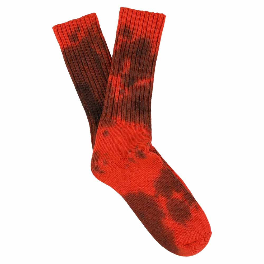 One-of-a-kind men's tie dye crew socks in orange and black, hand-dyed, made in Portugal by Escuyer