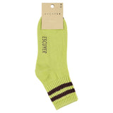 Close-up of Escuyer Women Striped Ankle Socks Green / Bordeaux — sophisticated stripe at the cuff
