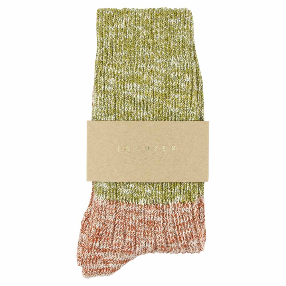 Green and brown sock with a beige band on a white background