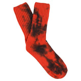 One-of-a-kind women's tie dye crew socks in orange and black, hand-dyed, made in Portugal by Escuyer