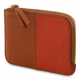 Escuyer cognac and orange zip wallet — vertical colour-block exterior, cognac left, orange right