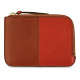Escuyer cognac and orange zip wallet showing vertical colour-block split and zip closure