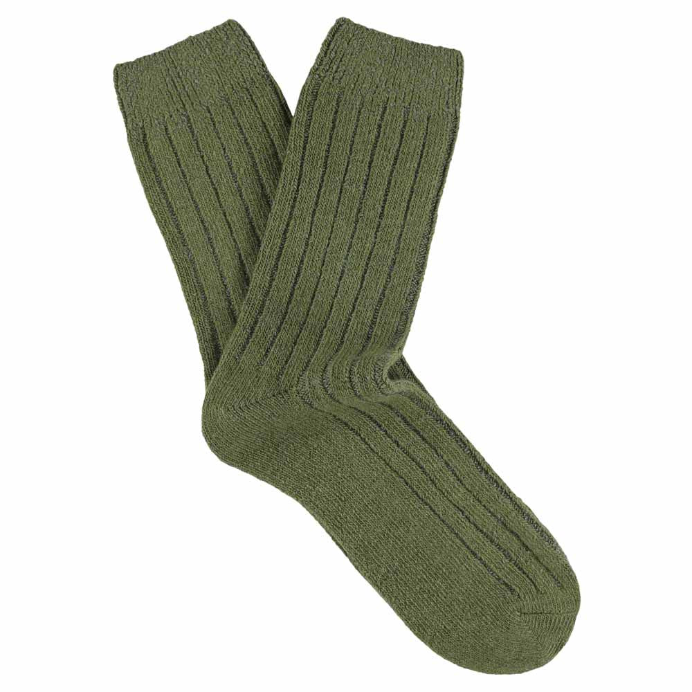 A pair of green cashmere crew socks for women displayed against a white background.