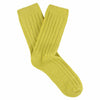 A pair of yellow cashmere crew socks for women, showing a ribbed texture and heel counter.